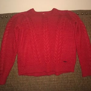 Red hollister sweater in good condition.